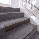 Dark Bronze single insert chevron stair nosing, 65mm riser with Mid Grey insert, fitted on carpeted stairs