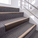 Dark Bronze single insert chevron stair nosing, 65mm riser with Sahara insert, fitted on carpeted stairs