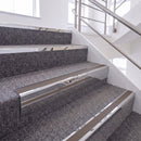 Mirrorflect Silver single insert chevron stair nosing, 65mm riser with Brown insert, fitted on carpeted stairs