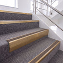 Satin Bronze single insert chevron stair nosing, 65mm riser with Brown insert, fitted on carpeted stairs