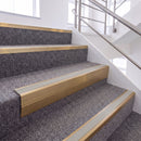 Satin Bronze single insert chevron stair nosing, 65mm riser with Oyster insert, fitted on carpeted stairs
