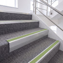 Satin Silver single insert chevron stair nosing, 65mm riser with Apple Green insert, fitted on carpeted stairs