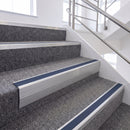 Satin Silver single insert chevron stair nosing, 65mm riser with Blue insert, fitted on carpeted stairs