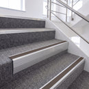 Satin Silver single insert chevron stair nosing, 65mm riser with Brown insert, fitted on carpeted stairs