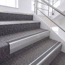 Satin Silver single insert chevron stair nosing, 65mm riser with Mid Grey insert, fitted on carpeted stairs