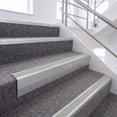 Satin Silver single insert chevron stair nosing, 65mm riser with Oyster insert, fitted on carpeted stairs