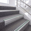 Satin Silver single insert chevron stair nosing, 65mm riser with Sage Green insert, fitted on carpeted stairs