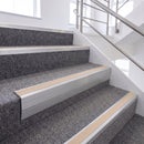 Satin Silver single insert chevron stair nosing, 65mm riser with Sahara insert, fitted on carpeted stairs