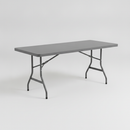 Grey 6ft rectangular contract folding table (1830 x 760mm) unfolded and standing on its powder-coated steel legs, ready for use in a school hall, community centre or event setting