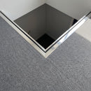 Bright polished aluminium welded corner angle turning the open corner of a carpeted landing above a stairwell