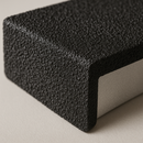 GRP tread cover anti-slip impregnated grit surface macro detail