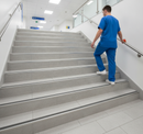 DDA anti-slip stair nosing with Grey PVC insert — installed on UK public building staircase, Part M compliant
