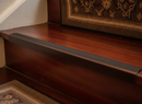 Brown anodised aluminium stair nosing 1200mm on dark mahogany traditional staircase