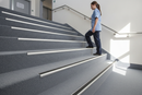 Heavy duty carpet stair nosing with Grey insert — installed on UK carpeted staircase, anti-slip protection over carpet