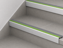 Dolphin grey and green slimline insert stair nosings fitted to two grey tiled steps