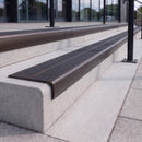 Dark bronze 84mm double channel bullnose aluminium stair nosing with twin Coal black gritted exterior-grip inserts fitted on leisure centre entrance steps