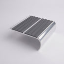 98x40mm bullnose double channel aluminium stair nosing profile on a plain studio background