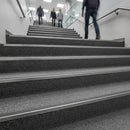 Durastep Jumbo heavy-duty stair nosing installed on commercial carpet staircase UK office building