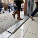 37mm polished aluminium carpet cover strip for indoor flooring transitions, showing smooth metallic finish