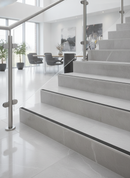 Brushed Stainless Steel R11 Anti-Slip Stair Nosing on commercial tiled staircase UK