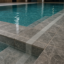 Clear anti-slip tape on luxury pool steps — invisible waterproof grip for wet surfaces