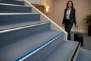 Heavy duty carpet stair nosing with Blue insert — installed on UK carpeted staircase, anti-slip protection over carpet