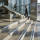 Commercial aluminium stair nosing for tile applications showing 10mm and 12mm profiles with anti-slip design