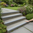 Grey PVC anti-slip stair nosing on outdoor concrete garden steps