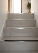 Retro-fit stainless steel stair nosing R10 with Black RAL 9011 anti-slip tread insert TREP-GLK