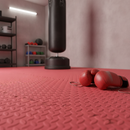 Red diamond-plate interlocking EVA foam floor tiles fitted in a home garage boxing and fitness corner