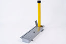 Traffic yellow fold down parking post with black locking top cap and galvanised ground plate, on a white background