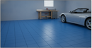 Blue interlocking PVC garage floor tiles fitted in a workshop with convertible sports car