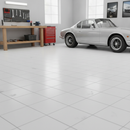 White interlocking PVC garage floor tiles fitted in a bright garage with classic silver car