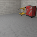 Commercial workshop unit floor fully tiled in mid grey diamond-plate PVC interlocking tiles with a tool chest and engine hoist