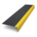 Anti-slip GRP stair tread cover in black with yellow 55mm nosing on a white studio background