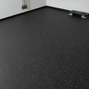 Physiotherapy and rehab gym room floor covered in black rubber flooring with light grey flecks