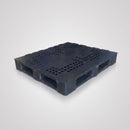 Empty black recycled HDPE plastic pallet on a plain grey studio background, showing the perforated semi-closed deck and the five-runner base with open fork tunnels