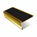 Rake back aluminium stair nosing, 62mm tread, premium black insert, mirrorflect gold finish