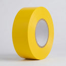 Heavy duty yellow vinyl line marking tape roll, 1000 micron floor tape, 25m roll on neutral studio background