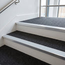 Ice grey PVC insert fitted in aluminium stair nosings on a university staircase