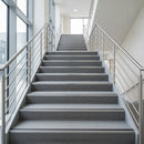 NHD05 heavy duty aluminium stair nosing installed across all steps of UK commercial building staircase