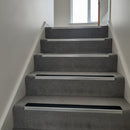 NHD05 aluminium stair nosing with mid grey anti-slip PVC insert on UK residential staircase