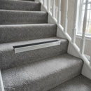 Heavy duty aluminium stair nosing with midnight grey anti-slip insert on UK residential hallway staircase