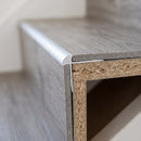 End view of the 42x28mm LVT stair nosing: 5mm vinyl flush with the bead, flange and leg hidden under the planks