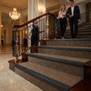 Matt black finish self-adhesive aluminium stair nosing 30mm x 20mm fitted to a step edge