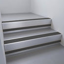 Mill Aluminium finish with Black Anodised Aluminium insert and Black Smooth Textured riser highlight - aluminium stair nosing 66x55mm fitted to a step edge