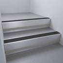 Mill Aluminium finish with Black Smooth Textured insert and Black Castellated riser highlight - aluminium stair nosing 66x55mm fitted to a step edge