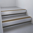 Mill Aluminium finish with Bronze Aluminium insert and Black Smooth Textured riser highlight - aluminium stair nosing 66x55mm fitted to a step edge