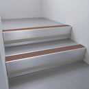 Mill Aluminium finish with Claret Castellated insert and Black Castellated riser highlight - aluminium stair nosing 66x55mm fitted to a step edge