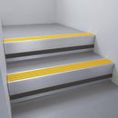 Mill Aluminium finish with Gold Castellated insert and Black Smooth Textured riser highlight - aluminium stair nosing 66x55mm fitted to a step edge